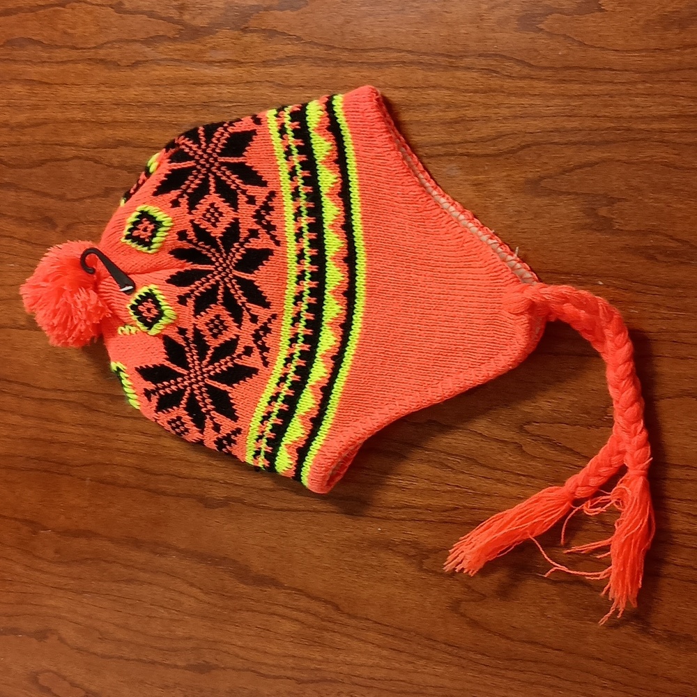 Flap Hat Winter hat covers ears and keeps them warm and cozy.